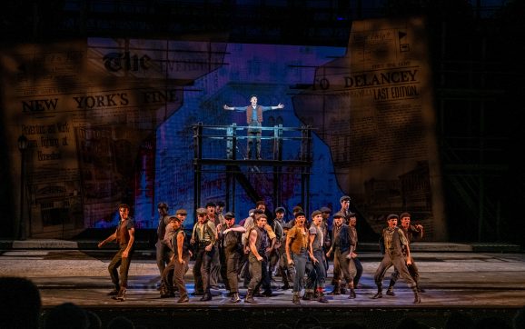 The Muny’s ‘Newsies’ Triumphs With High-Spirited Bravado and Charm